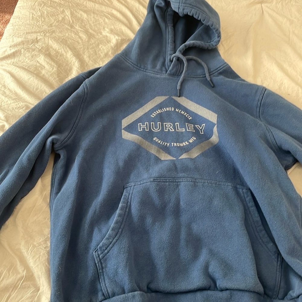 Navy blue sweatshirt designed by Hurley
